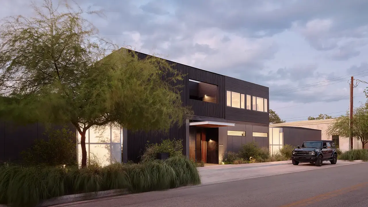 Frame SoCo exterior at dusk with warm lighting and a serene South Congress arrival