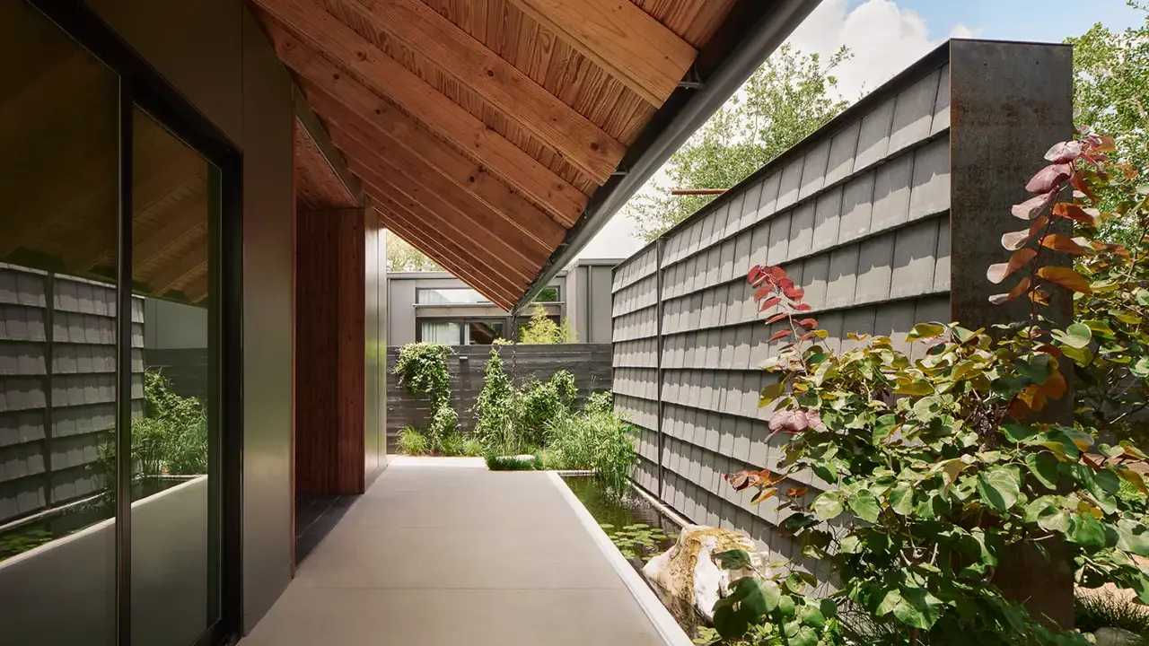 Frame Hotel SoCo — koi pond garden opening into a private suite