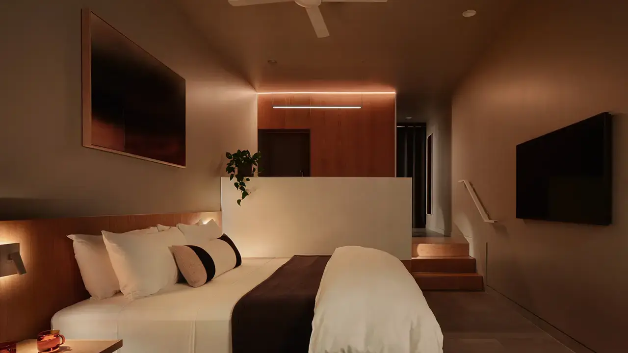 A Frame Hotel SoCo suite at night, seen from the private lanai